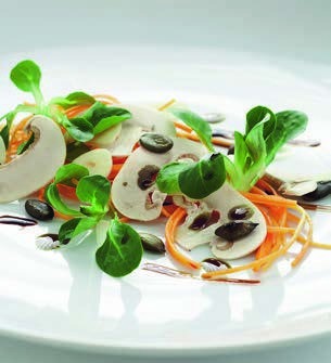 Mushroom and lamb's lettuce salad with carrots and pumpkin seeds
