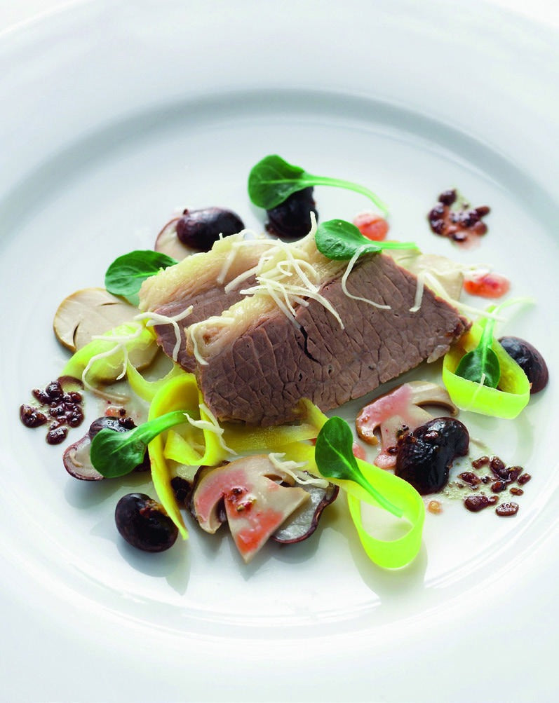 Austrian Tafelspitz beef salad with vegetables, mushrooms and horseradish