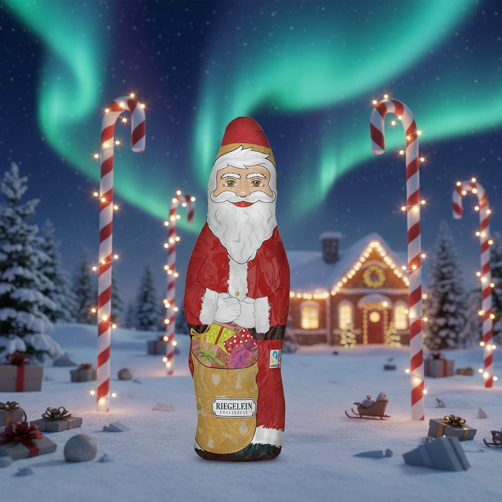Riegelein 6.5-inch milk chocolate Santa in a snowy holiday scene