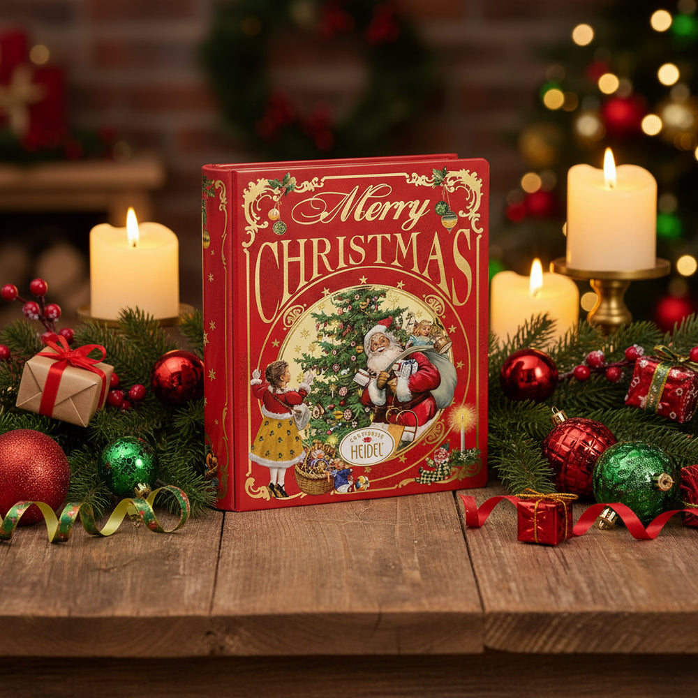 Heidel Christmas Nostalgia book tin with milk chocolate bars in a holiday scene