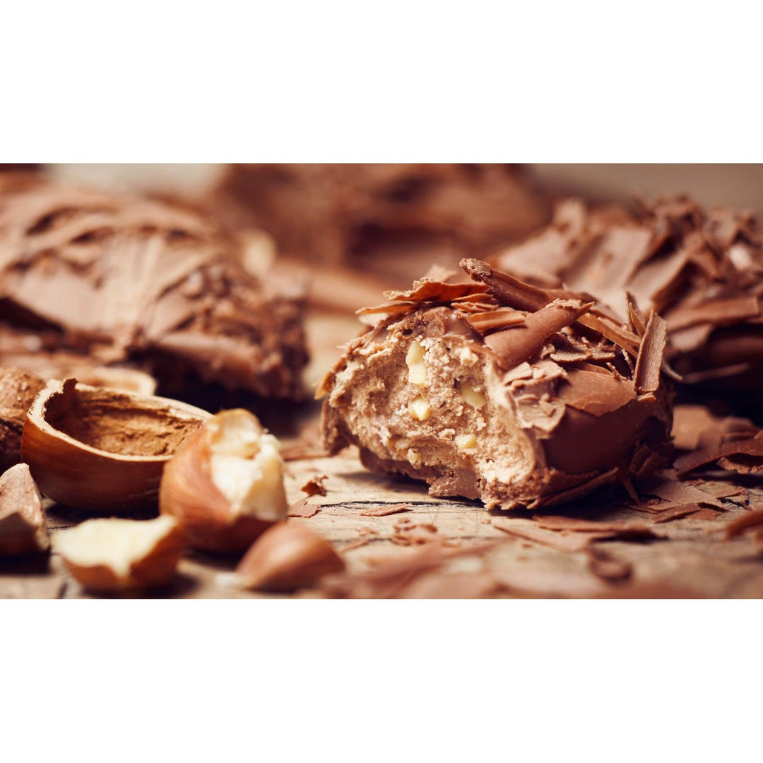Cut-open Duc d’O milk crunchy biscuit flaked truffle with chocolate flakes