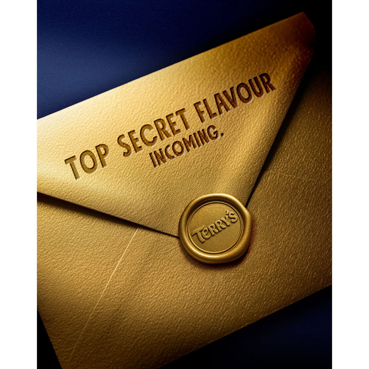 Gold envelope reading Top Secret Flavour Incoming with a Terry's seal