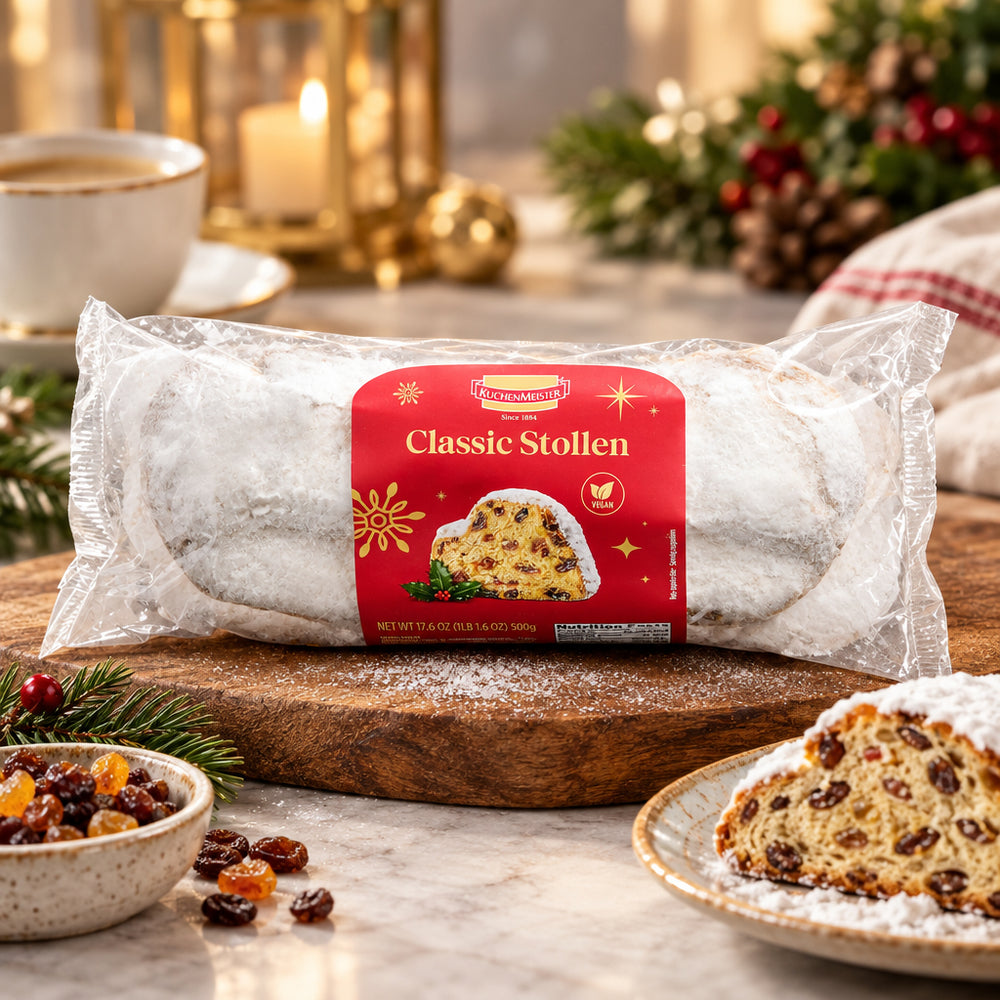 Kuchenmeister Classic Stollen with sliced loaf in a Christmas scene