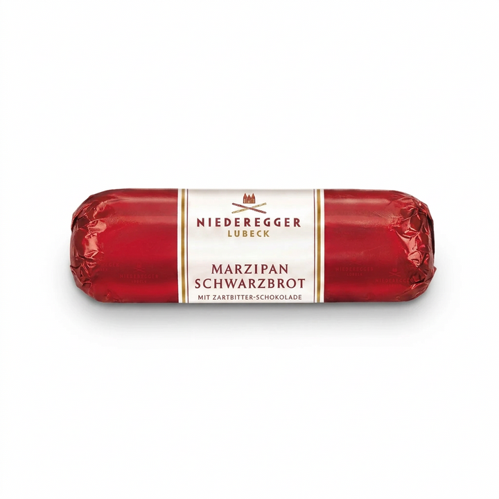 Red roll of marzipan Schwarzbrodt with Niederegger label on a white background