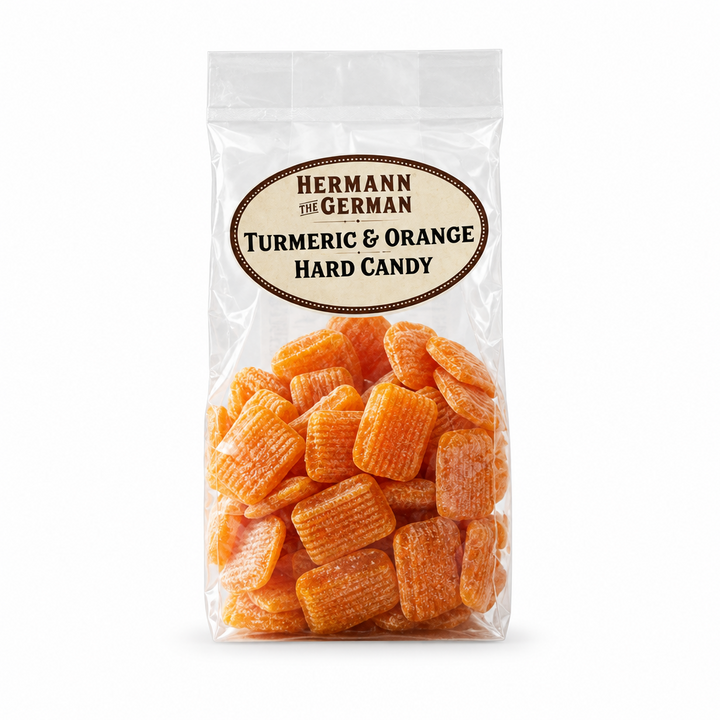 Hermann the German Tumeric & Orange Hard Candy package on a white background