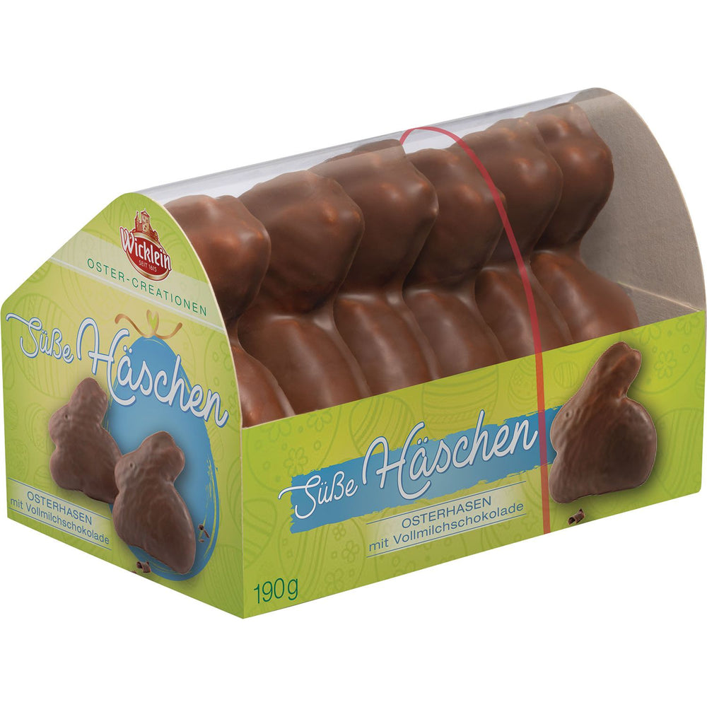 Packaged chocolate Easter bunnies with green and brown design on a white background