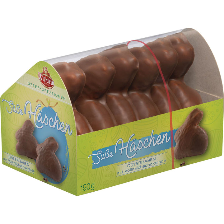 Packaged chocolate Easter bunnies with green and brown design on a white background