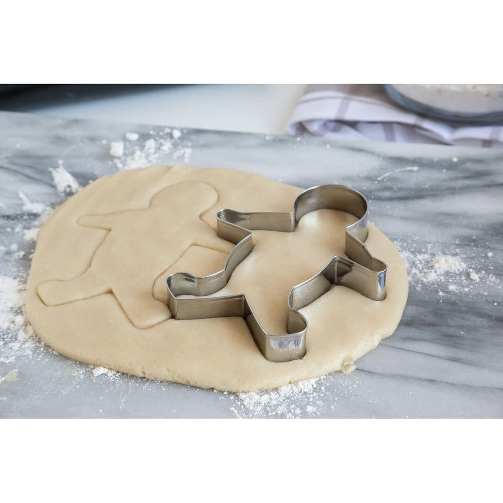 Fox Run 5-inch gingerbread man cookie cutter on rolled dough