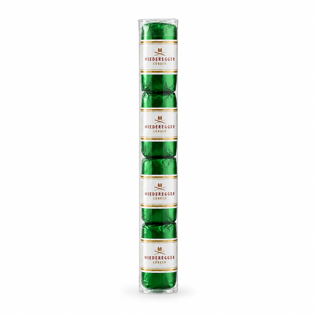 Niederegger Classics dark chocolate pistachio marzipan pralines on white background
