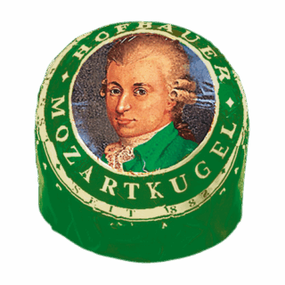Individually wrapped Hofbauer pistachio Mozart Ball in green foil