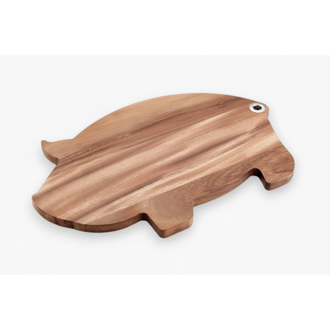 Wooden pig-shaped cutting board on a white background