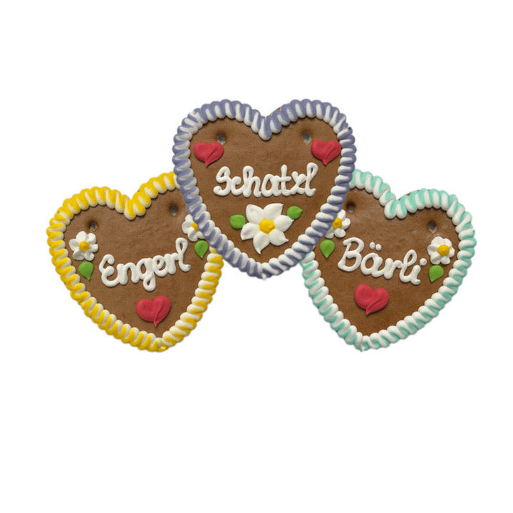 Three assorted decorated German gingerbread hearts