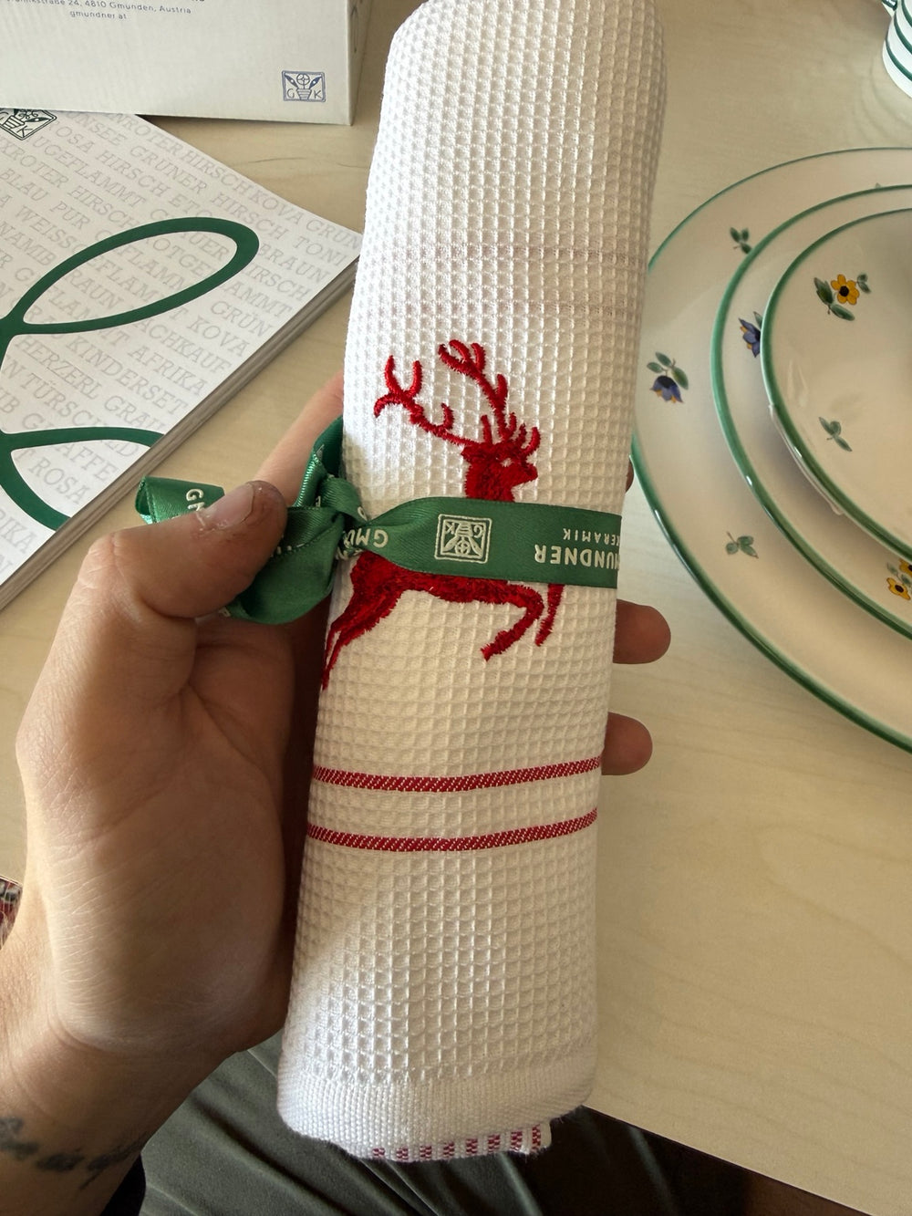 Actual Red Deer tea towel rolled with Gmundner Keramik ribbon