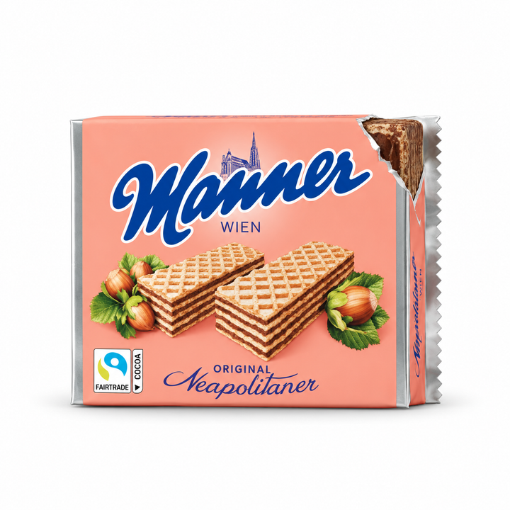 Manner Original Neapolitaner hazelnut wafer package with pink wrapper, blue Manner Wien logo and slightly opened corner on a white background