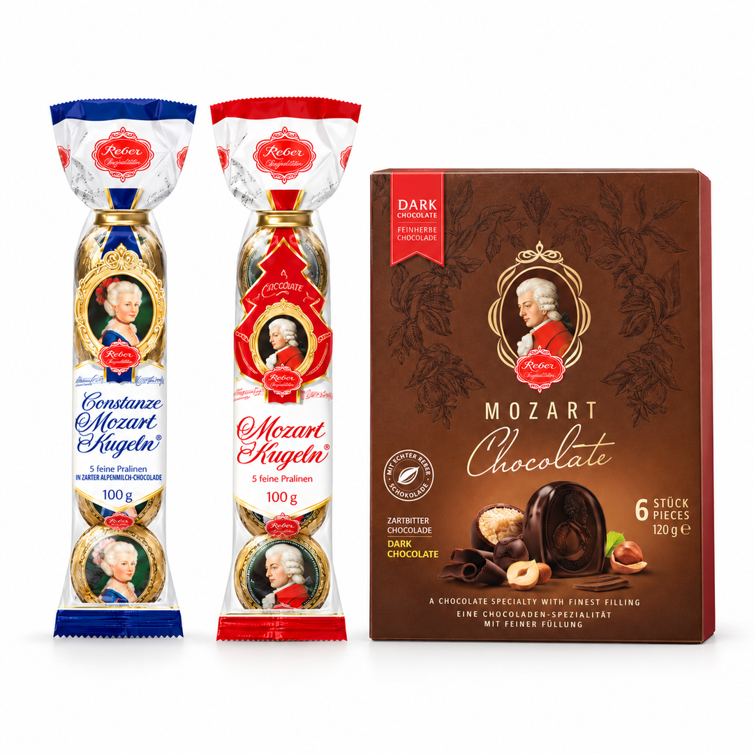 Reber tasting trio with one blue Constanze five-piece milk chocolate bag, one red classic Mozart five-piece bag and one six-piece dark chocolate portrait box on a white background