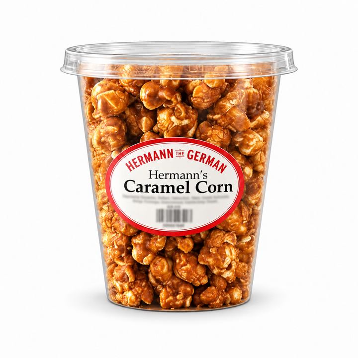 Sweet Castle caramel popcorn in a clear lidded container on a white background